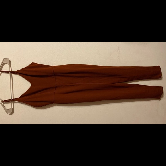 Never worn Spandex/Polyester jumpsuit - Picture 1 of 2